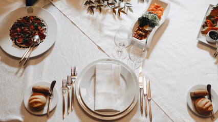 Elegant Restaurant Table Setting with Food