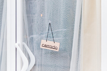 Cerrado sign on a yoga studio door