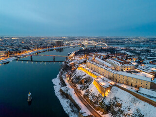 Aerial Night View of Illuminated Bridges over the Danube River in Winter, Novi Sad, Serbia