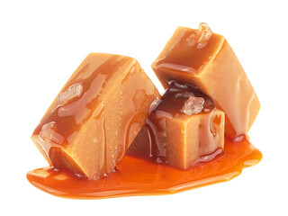 Caramel candies with sea salt isolated on a white background. Caramel pieces and melted caramel sauce.