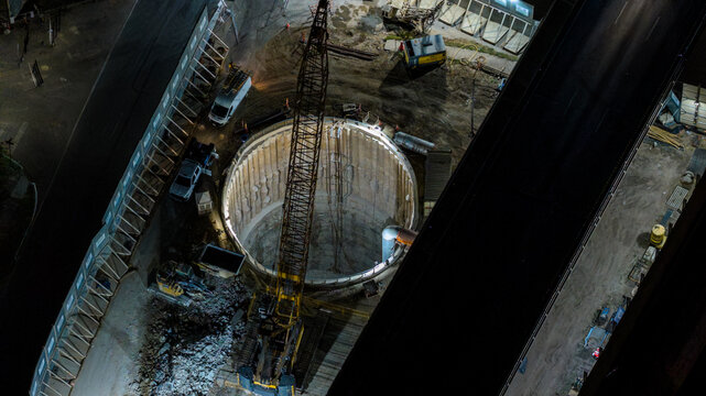 Aerial HDR Night View of I-35 Tunnel Excavation Shaft Between Highway Decks