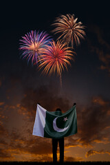 Girl with National flag of Pakistan on Independence day