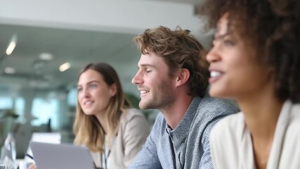Diverse Business Professionals Smiling and Engaged in an Office Meeting