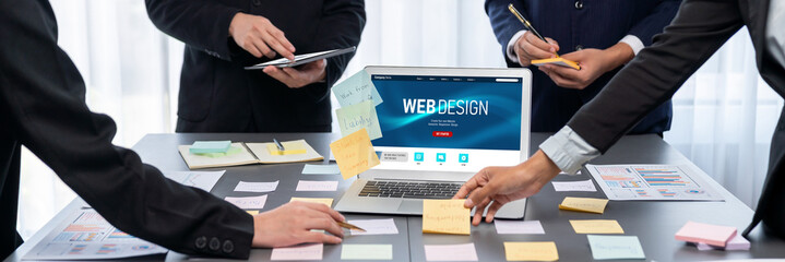 Analyst team use sticky note for creative and analytic brainstorm for business idea with BI data dashboard on laptop screen. Analysis financial data visualization tech for marketing strategy. Prodigy