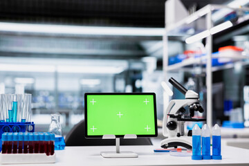 Isolated screen tablet in empty lab used by researchers to document clinical trial outcomes and research report. Mockup device in laboratory used for registering sample statistics in database