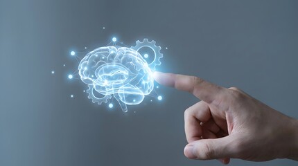 Illuminated brain hologram with gears and a finger touching it, representing artificial intelligence and cognition