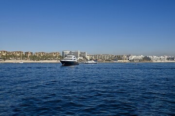 a super yacht anchored in Cabo