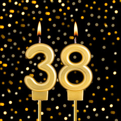Number 38 on a black background with blurred lights - Birthday card with abstract blurred lights that glow