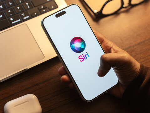 Siri logo is displayed on the screen of a smartphone, in Bangalore, India, on January 14, 2026