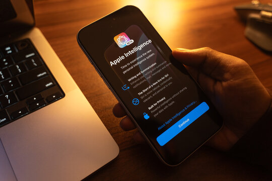 Apple Intelligence logo is displayed on the screen of a smartphone, in Bangalore, India, on January 14, 2026