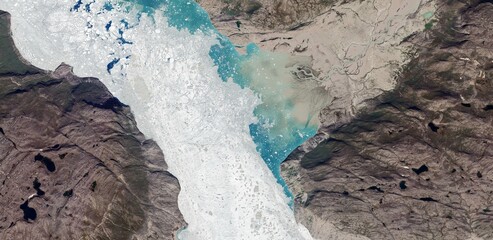 Satellite view of Greenland Arctic landscape with melting glaciers and rocky tundra