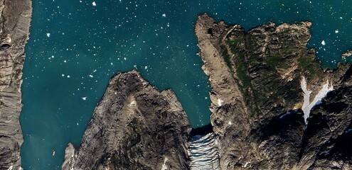 Satellite view of Greenland Arctic landscape with melting glaciers and rocky tundra