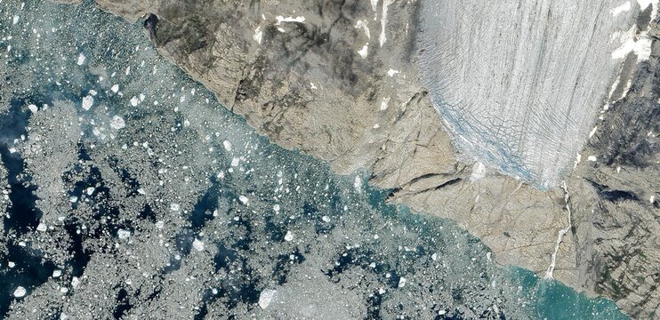 Satellite view of Greenland Arctic landscape with melting glaciers and rocky tundra - Powered by Adobe