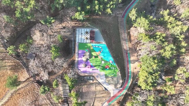 Supsori Park sheep farm, monorail track, and children's playground aerial view