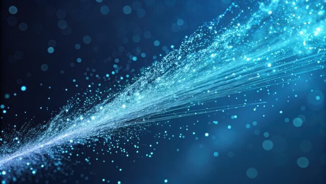 A vibrant blue splash of sparkling particles creates a dynamic visual effect, evoking movement and energy against a dark background.