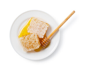 Top View of Organic Honeycomb and Wooden Dipper on White Plate Isolated on White Background, Fresh Raw Honey Concept for Health and Nutrition