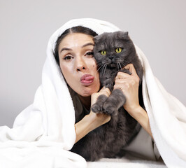 woman with cat. Animal. Woman cat. Photo. Happy day. Funny face