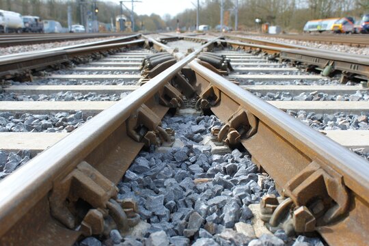 Complex metal railway junction with intersecting tracks