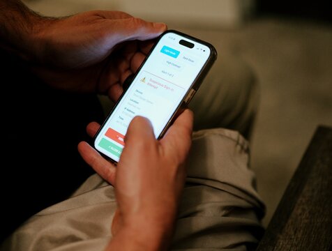 Middle Aged Man Gets Several Suspicious Sign In Alerts Related to Foreign IP Addresses Accessing Internet of Things Devices in His Home - Concept