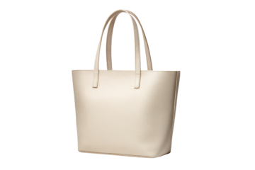 Cream colored leather tote bag with double handles on black background handbag