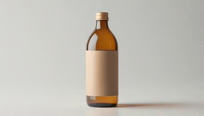 Brown glass bottle with blank label on white background