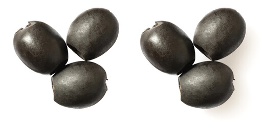 Pitted black olives isolated on white background, top view.