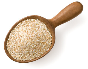 Raw oat bran in the wooden spoon, isolated on white background, top view.