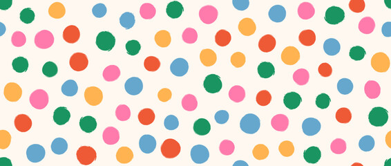 Colorful clown polka dot seamless pattern. Repeated round painted confetti background. Happy bright dotted wallpaper for Easter wrapping paper, birthday decoration, kid bday nursery decor. Vector