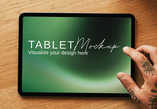 Tablet Mockup With Hand Tattoo PSD