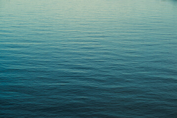 Abstract blue sea water surface texture background with ripples