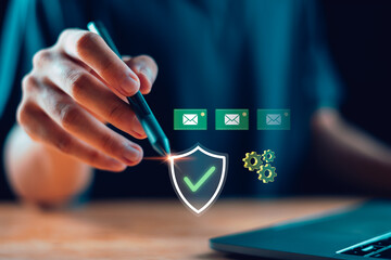 A glowing digital shield icon with email and gear symbols represents secure communication, email protection, cybersecurity systems, and modern digital data security in a connected tech environment.