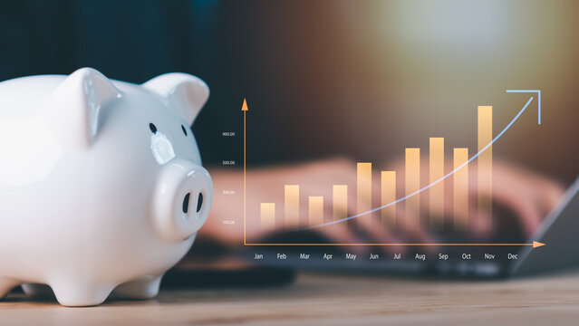 Piggy bank with growing bar and line graph on laptop background, symbolizing savings, financial growth, investment planning, passive income, business success, and personal finance strategy - Powered by Adobe