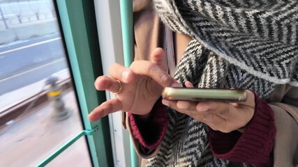 Using a phone while commuting on a bus