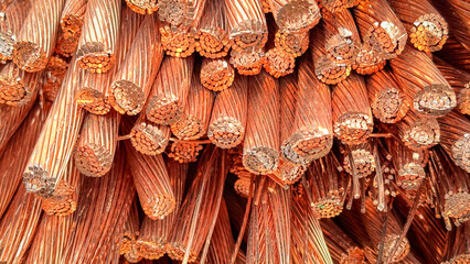 Detailed close-up of a heap of frayed and cut copper wires with visible strands and natural oxidation