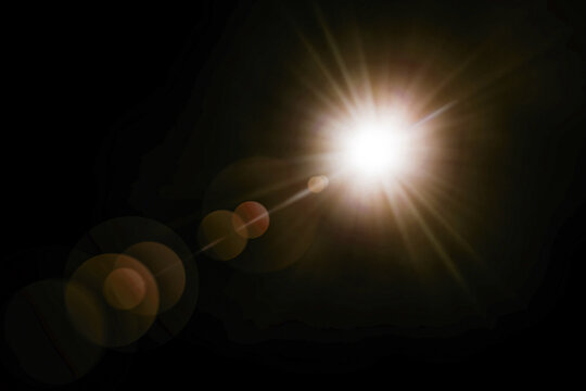 sunlight background, sun flare ,yellow glare on black background.
