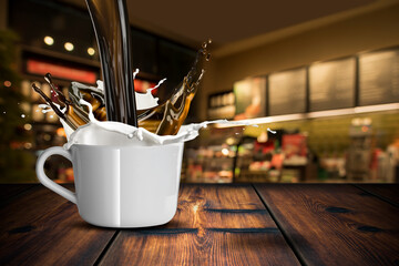 Coffee Pour Splash on Coffee Cup With Milk Splash and Coffee Beans. Capture using High Speed Photography With Coffee Shop Scene