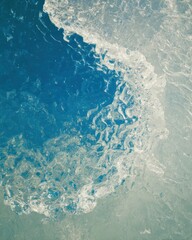 Fototapeta premium Authentic Melting Ice Water Close-up Textured Droplets for Environmental Awareness Marketing and Modern Advertising Content