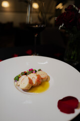 Elegant cuisine presentation on a pristine white plate, a fine dining experience