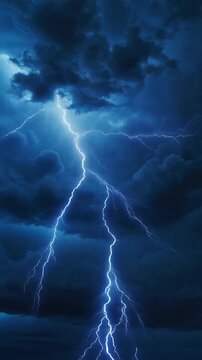 A bright blue lightning bolt strikes through a dark and ominous stormy night sky with heavy clouds