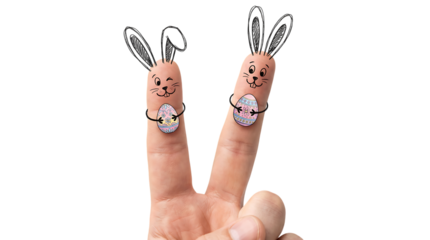 Hand with index and middle fingers decorated as cute Easter bunnies holding eggs peace sign transparent background