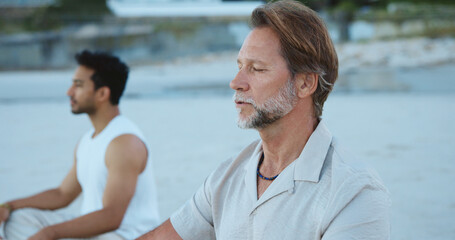 Men, breathing and meditation for wellness, beach and routine for inner peace, stress relief and zen. Outdoor, fresh air and people with spiritual awareness in nature, inhale or calm with mindfulness