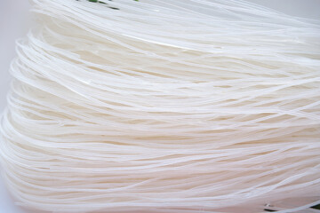Rice noodles close-up. Culinary background.