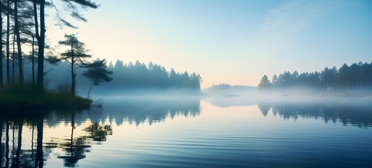 Fototapeta premium A peaceful landscape of a misty lake at dawn,generative AI