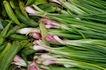Selling fresh vegetables in a traditional market