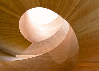 Wooden spiral staircase Curve warm lighting Architecture details