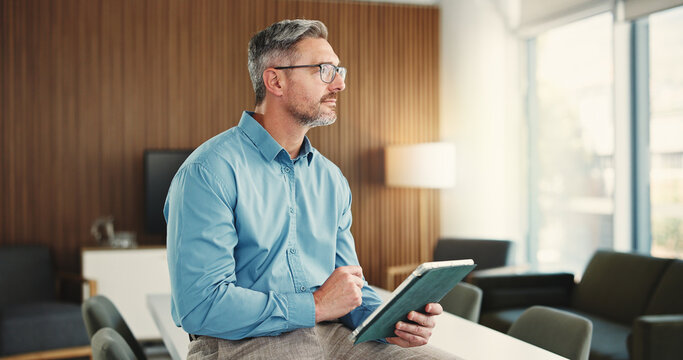 Thinking, corporate and man with tablet in office for solution, real estate and listing research. Mature realtor, digital and ideas for expansion negotiation, resale opportunity and viewing schedule