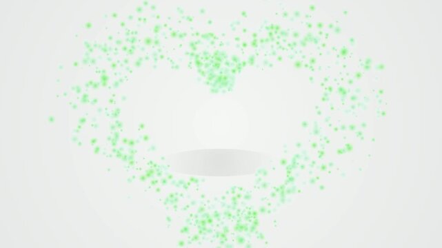 Dynamic green dots coalesce into a heart and circle shape