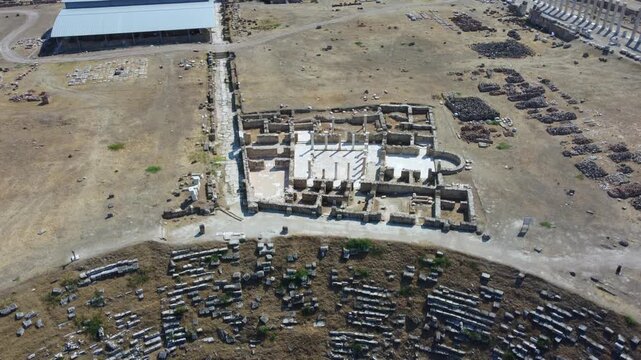 IERAPOLIS in Denizli, bird's-eye view, TURKEY, August 13, 2024: Ancient city of Ierapolis near Pamukkale, surrounded by nature and mountains. Phrygian period. UNESCO.4K
