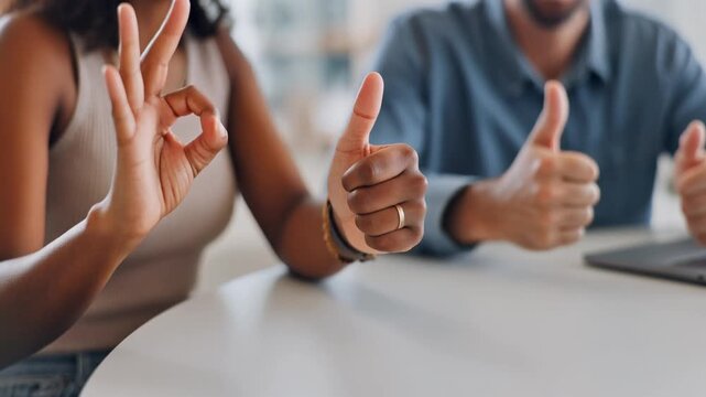 Diverse Hand Gestures During a Virtual Meeting. Educational / eLearning & Up-skilling. Three diverse hands making expressive gestures over a desk, subtly suggesting an engaging virtual team meeting.
