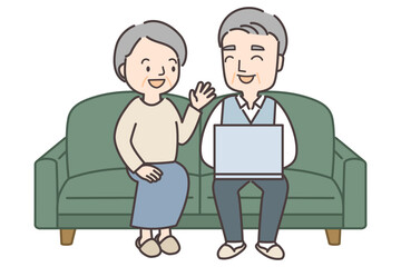 ソファに座り会話を楽しむシニア夫婦